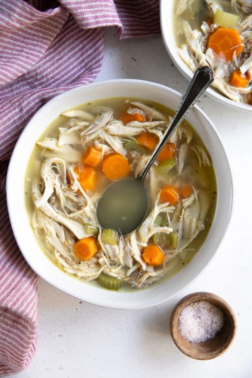 Clear chicken broth with soft carrots