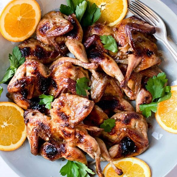 Fried quail with orange and ginger glaze