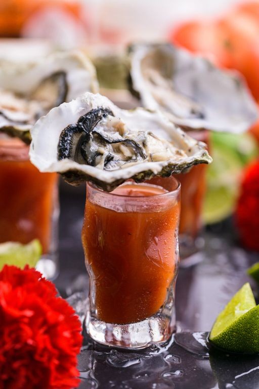 Oyster Shooters with Vodka and Cocktail Sauce