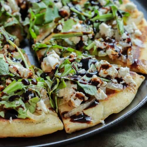 Puttanesca Flatbread with Arugula and Balsamic Glaze
