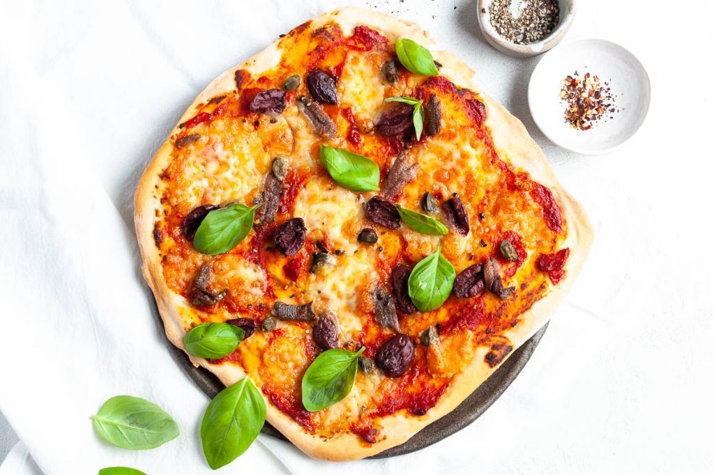 Puttanesca Pizza with Black Olives and Fresh Oregano