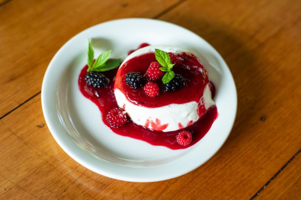 Vanilla Bean Panna Cotta Shooters with Berry Coulis
